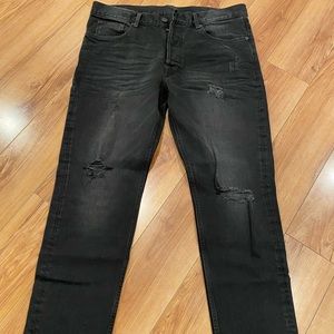 Distressed denim jeans